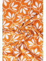 serviette de toilette fleurs écrues sur fond orange