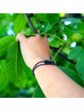 bracelet corde d'escalade noir avec petits points de couleurs oranges et verts