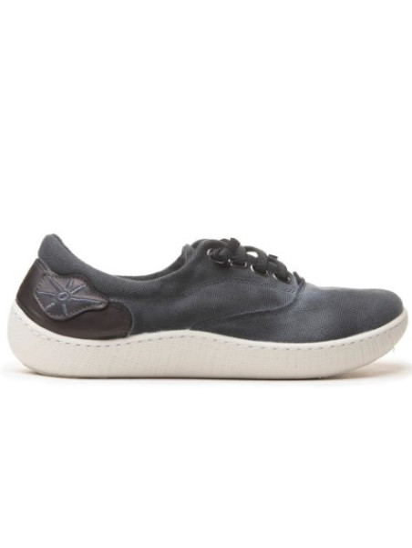 basket en toile grises semelles blanches soleil sur le côté