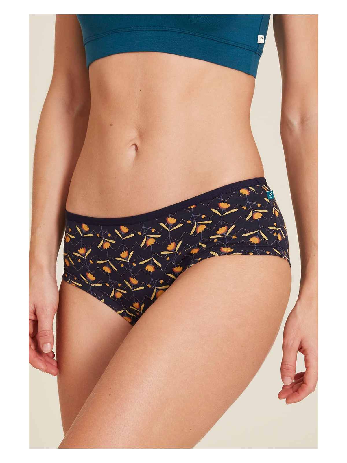 panty imprimé petites fleurs sur fond marine