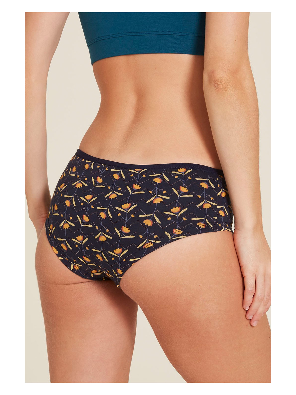 panty imprimé petites fleurs sur fond marine