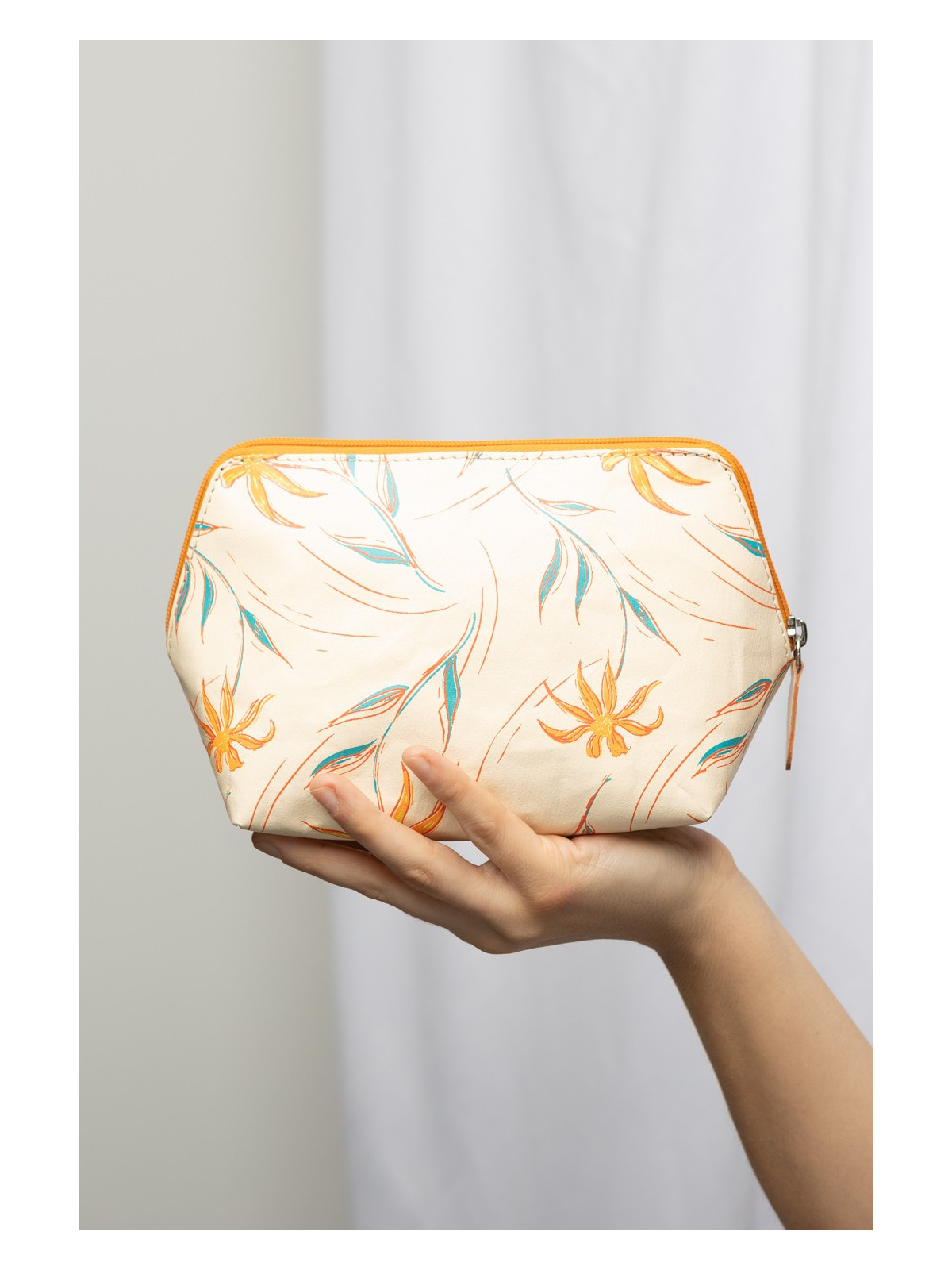 trousse cosmétique beige avec motifs fleurs orange