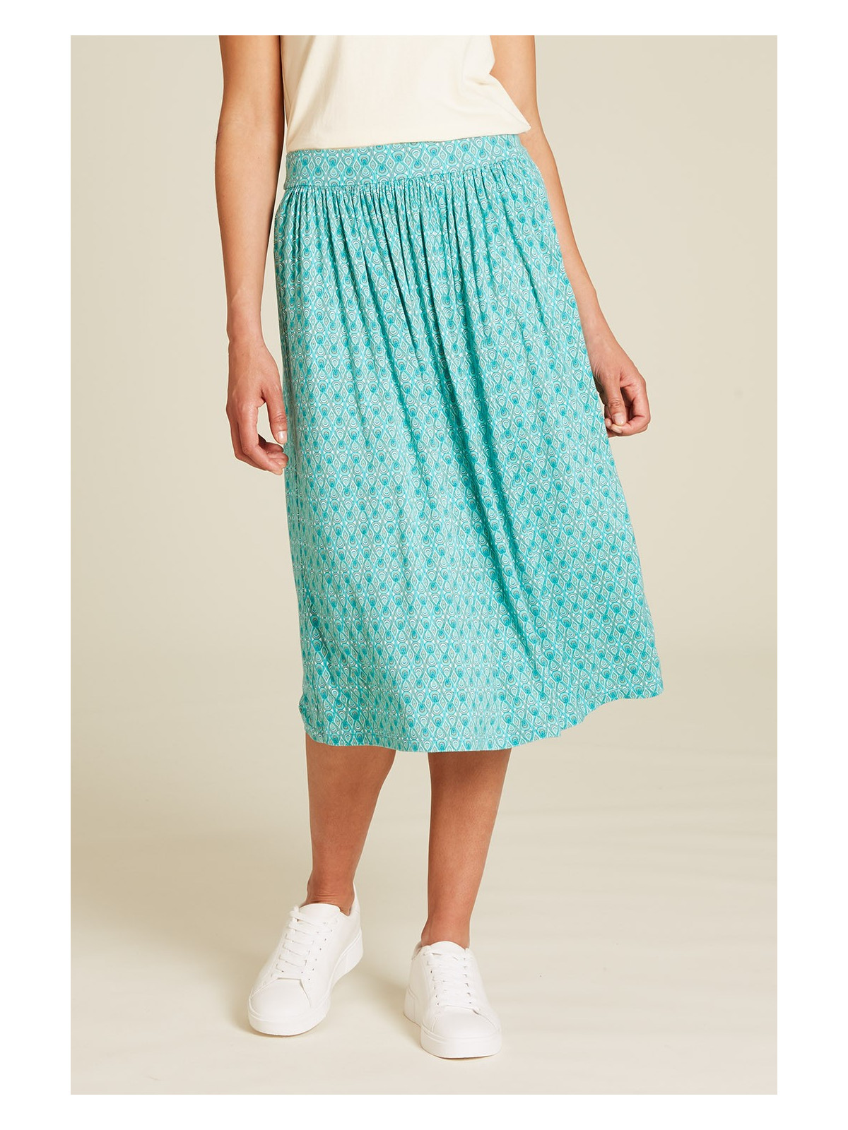 jupe longueur sous le genou bleu turquoise avec petits motifs