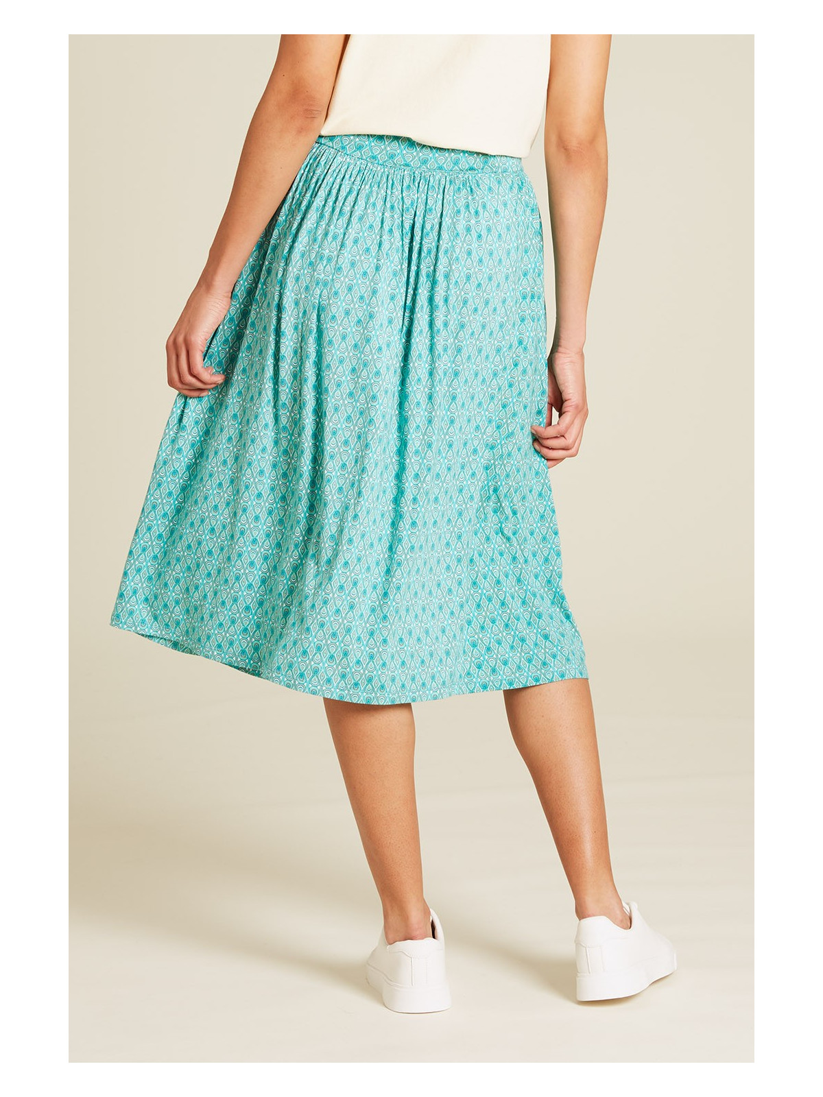 jupe longueur sous le genou bleu turquoise avec petits motifs