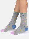 chaussettes grises avec motifs papillons multicolores
