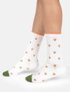 chaussettes écrues pointe verte motifs champignons oranges