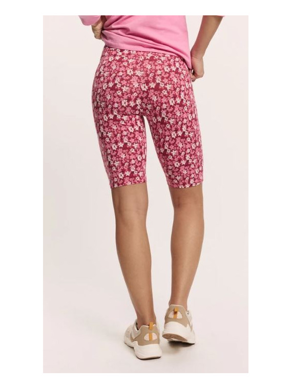 short cycliste longueur au-dessus du genou fleurs rouges sur fond blanc